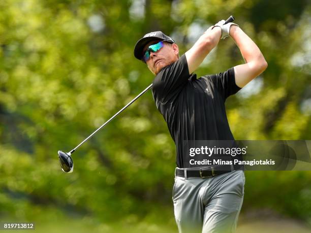 Scott Vincent of Zimbabwe tees off from the first hole during round one of the Mackenzie Investments Open held at Club de Golf Les Quatre Domaines on...