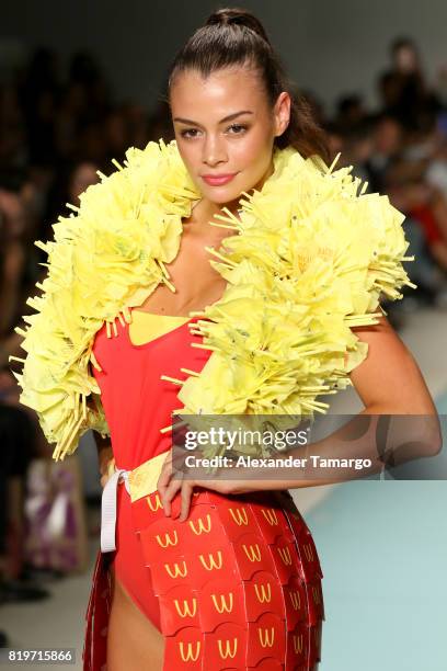 Model walks the runway at McDCouture Makes A Splash At Miami Swim Week at 2100 Collins Ave. On July 20, 2017 in Miami, Florida. McDonalds made a...