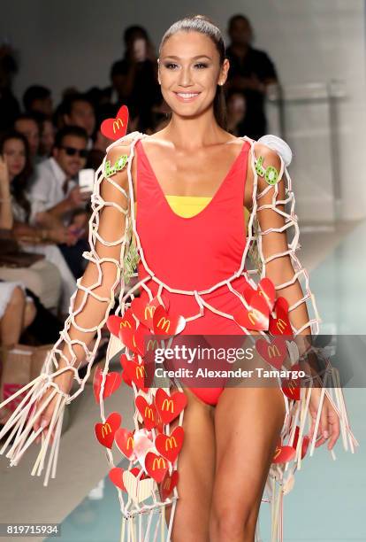 Model walks the runway at McDCouture Makes A Splash At Miami Swim Week at 2100 Collins Ave. On July 20, 2017 in Miami, Florida. McDonalds made a...