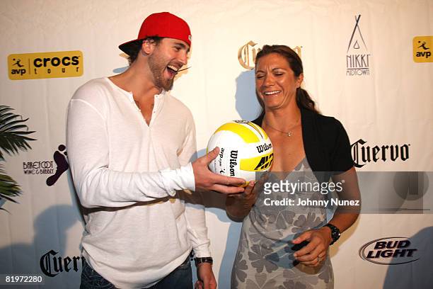 Aaron Voros and Misty May Treanor attend the 25th anniversary celebration of AVP Pro Beach Volleyball at Nikki Beach on July 17, 2008 in New York...