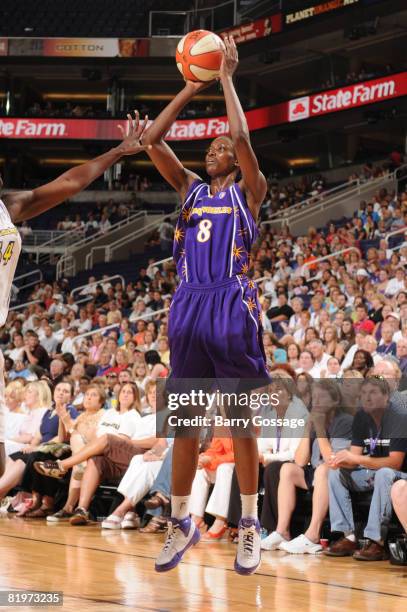 Delisha Milton Jones of the Los Angeles Sparks shoots against the Phoenix Mercury on July 17 at U.S. Airways Center in Phoenix, Arizona. NOTE TO...