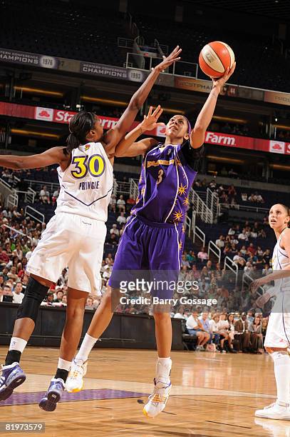 Candace Parker of the Los Angeles Sparks shoots against La Toya Pringle of the Phoenix Mercury on July 17 at U.S. Airways Center in Phoenix, Arizona....