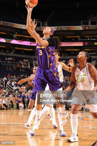 Candace Parker of the Los Angeles Sparks shoots against Le'coe Willingham of the Phoenix Mercury on July 17 at U.S. Airways Center in Phoenix,...