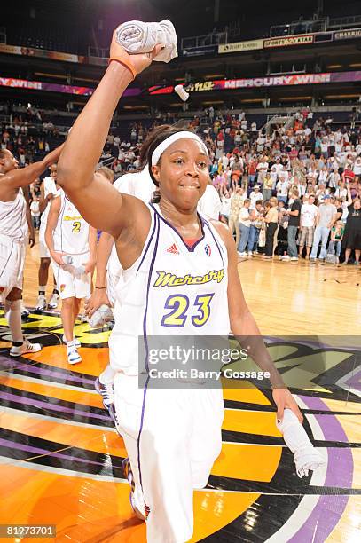 Cappie Pondexter of the Phoenix Mercury throws T-shirts to fans following a victory over the Los Angeles Sparks July 17 at U.S. Airways Center in...