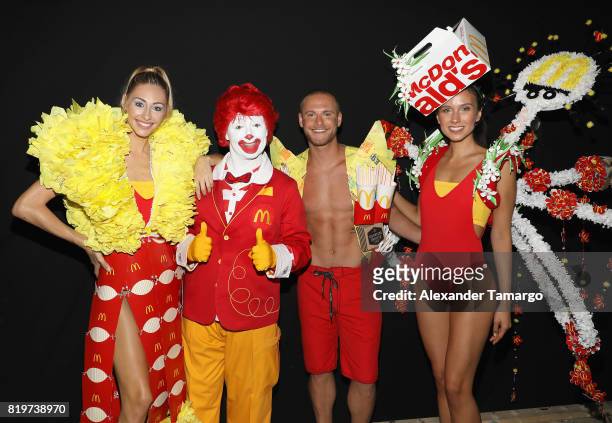 Models pose with Ronald McDonald at McDCouture Makes A Splash At Miami Swim Week at 2100 Collins Ave. On July 20, 2017 in Miami, Florida. McDonalds...
