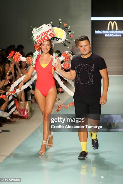 Model walks the runway with Miami international University of Art and Design Fashion Student Pablo Machado Palomeque, winner of the McDCouture Design...