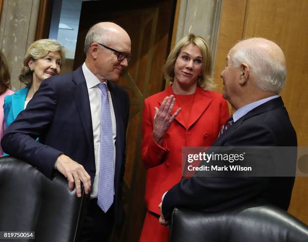 Robert Wood Johnson IV and Kelly Knight Craft talk with Sen. Ben Cardin before their Senate Foreign Relations Committee confirmation hearing on...