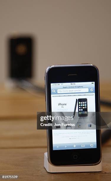 Customers queue to purchase a new iphone 3G at the O2 store in Oxford Street on July 11, 2008 in London, England.