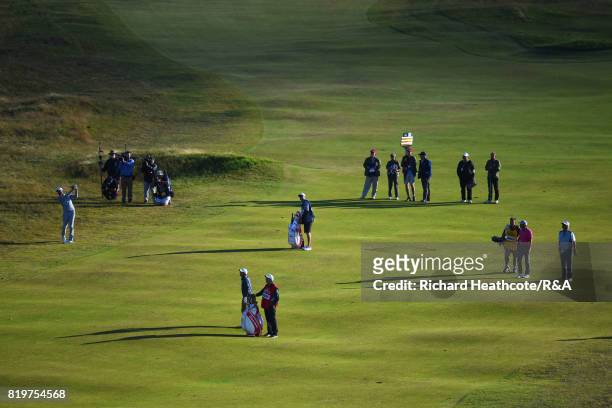 Dustin Johnson of the United States plays in to the 18th green during the first round of the 146th Open Championship at Royal Birkdale on July 20,...