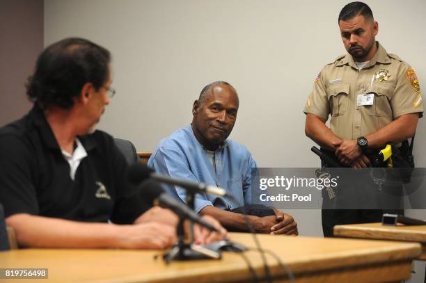 Simpson makes eye contact with Bruce Fromong attends during his parole hearing at Lovelock Correctional Center July 20, 2017 in Lovelock, Nevada....