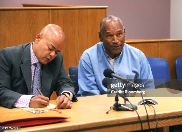 Former professional football player O.J. Simpson, right, speaks during a parole hearing at Lovelock Correctional Center in Lovelock, Nevada, U.S., on...