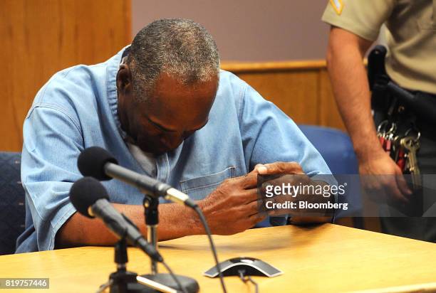Former professional football player O.J. Simpson reacts during a parole hearing at Lovelock Correctional Center in Lovelock, Nevada, U.S., on...