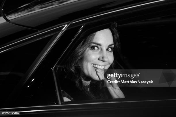 Catherine, Duchess of Cambridge departs after attending a reception with creatives at 'Claerchens Ballhaus' the last original dancehall in Berlin on...