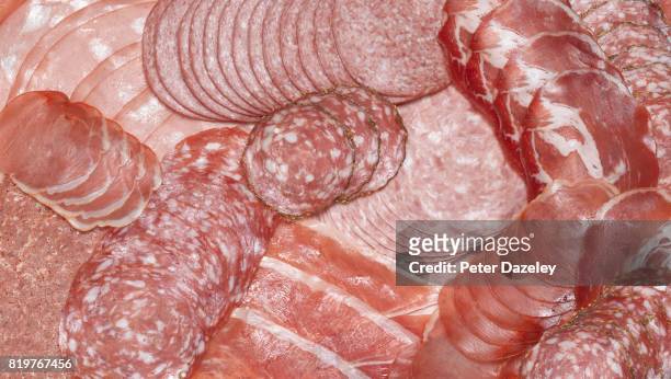 processed meats health risk - salami stock pictures, royalty-free photos & images