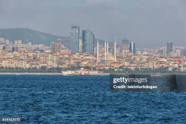 traditional passenger boat at coast of anatolian side of istanbul turkey - maltepe stock pictures, royalty-free photos & images