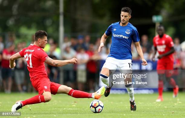 Danny Holla of Twente challenges Kevin Mirallas of Everton during a preseason friendly match between FC Twente and Everton FC at Sportpark de...