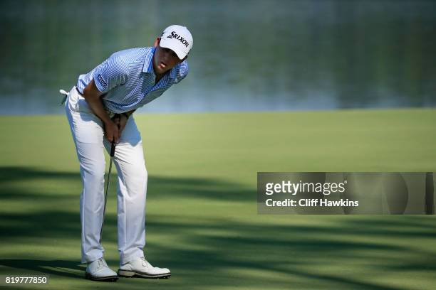 Smylie Kaufman of the United States reacts to a missed putt on the third green during the first round of the Barbasol Championship at the Robert...