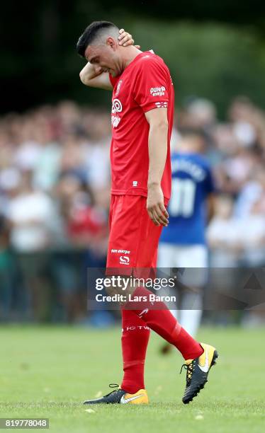 Haris Vuckic of Twente leaves injured the pitch during a preseason friendly match between FC Twente and Everton FC at Sportpark de Stockakker on July...