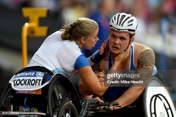 Hannah Cockroft of Great Britain comforts Ben Rowlings of Great Britain during day seven of the IPC World ParaAthletics Championships 2017 at London...