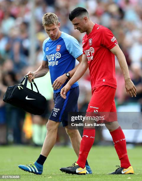 Haris Vuckic of Twente leaves injured the pitch during a preseason friendly match between FC Twente and Everton FC at Sportpark de Stockakker on July...