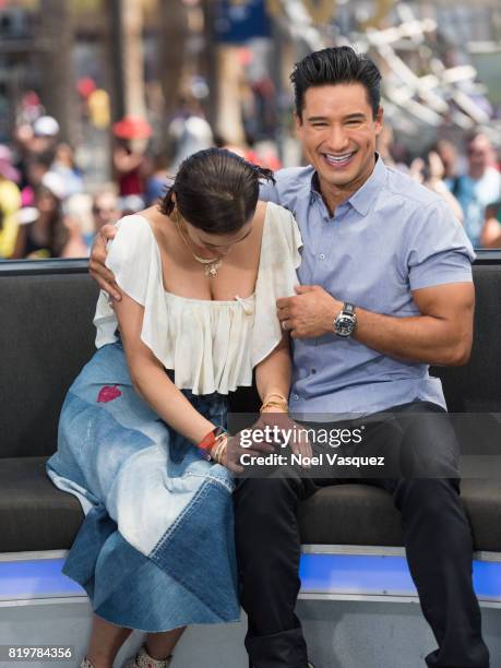 Paula Patton and Mario Lopez visit "Extra" at Universal Studios Hollywood on July 20, 2017 in Universal City, California.