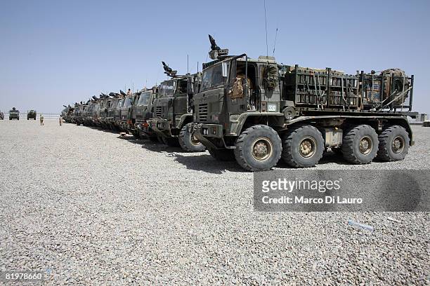British Army trucks from the 13 Air Assault Support Regiment ready and waiting to depart from their base for an operation to deliver supplies to...