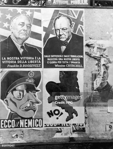 Posters of Roosevelt and Churchill, with quotes on the liberation from each, on a wall in Naples, Italy, circa 1945. Below are anti-nazi posters, one...