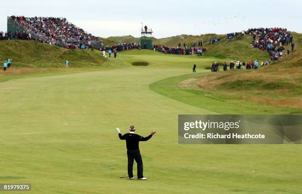 Colin Montgomerie of Scotland gestures as spectators cross the fairway on the 6th during the second round of the 137th Open Championship on July 18,...