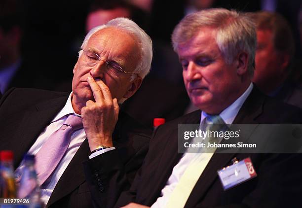 Former Bavaria's State Governor Edmund Stoiber and German Agriculture and Consumer Protection Minister Horst Seehofer are seen at the CSU party...