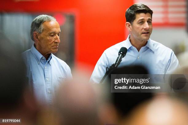 Speaker of the House Paul Ryan is joined by Jim Davis, the chairman and owner of New Balance as he talks about tax reform during a visit to the New...