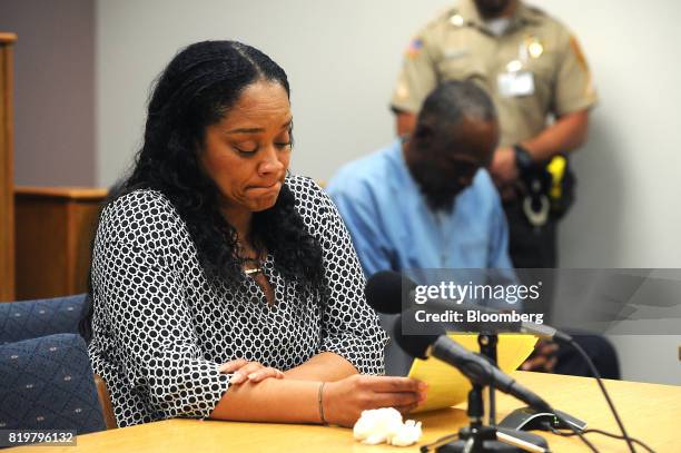 Arnelle Simpson, daughter of former professional football player O.J. Simpson, pauses while testifying during his parole hearing at Lovelock...