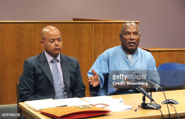 Former professional football player O.J. Simpson, right, speaks during a parole hearing at Lovelock Correctional Center in Lovelock, Nevada, U.S., on...