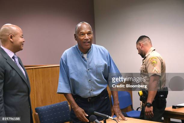 Former professional football player O.J. Simpson, stands after a parole hearing at Lovelock Correctional Center in Lovelock, Nevada, U.S., on...