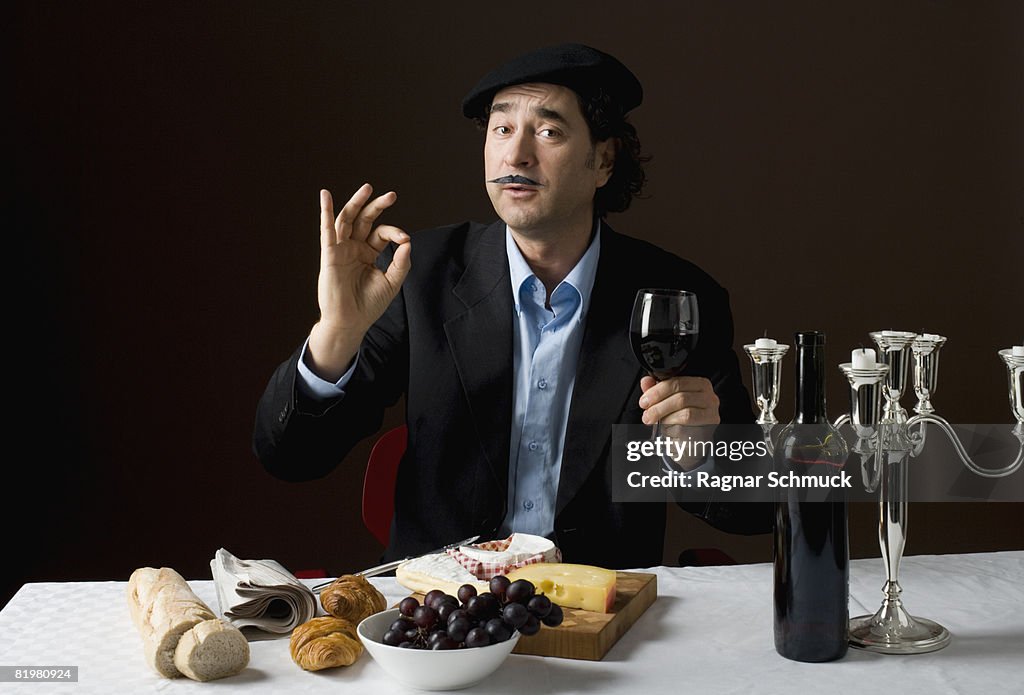 Stereotypical French man with stereotypical French food