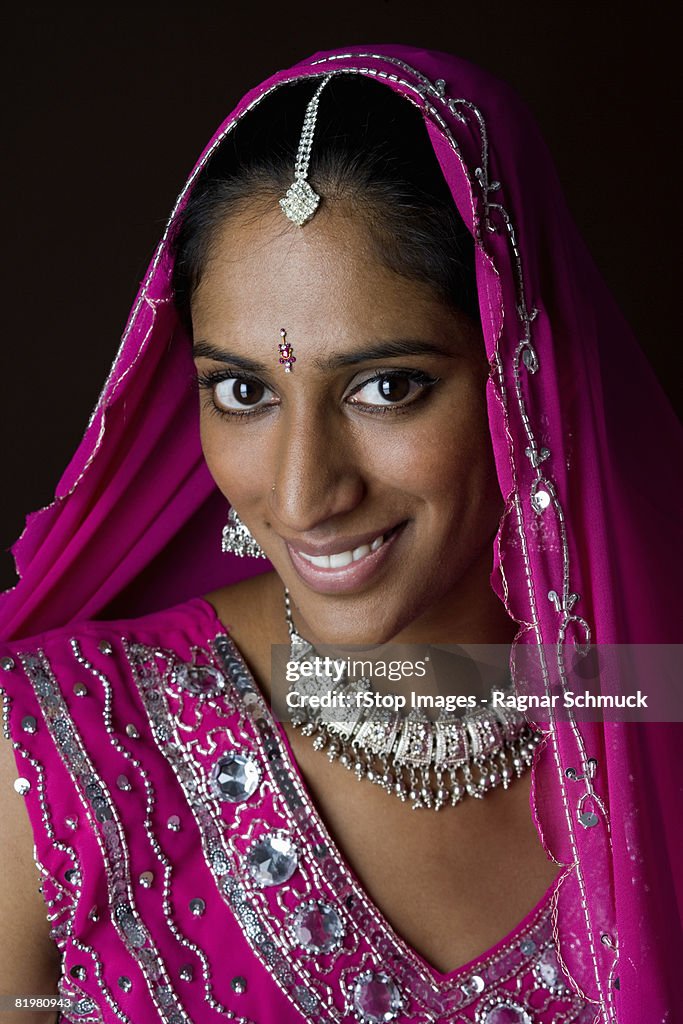 A woman dressed in traditional Indian clothing