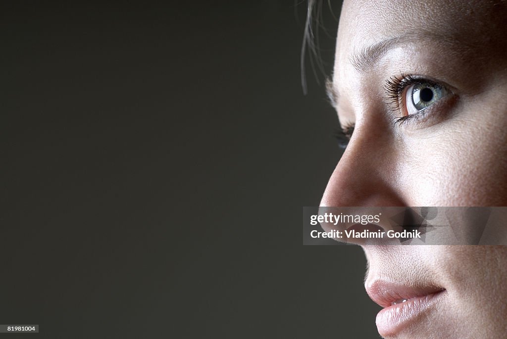 A close up profile shot of a woman