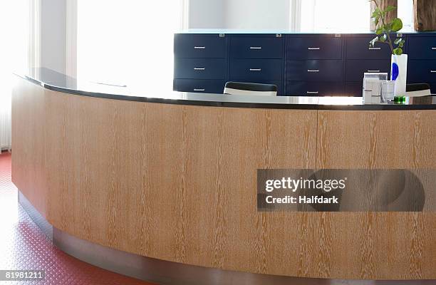 reception desk in a doctor?s surgery - doctor's surgery stock pictures, royalty-free photos & images