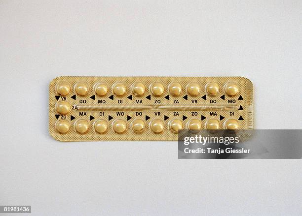 a pack of contraceptive pills - birth control pill pack stock pictures, royalty-free photos & images