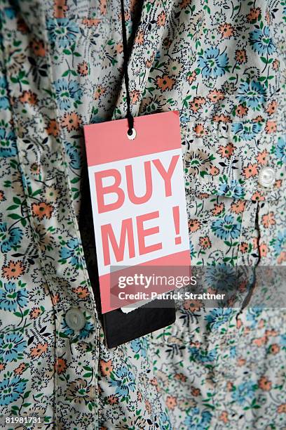 ?buy me!? price tag hanging from a lady?s blouse - hanging blouse stock pictures, royalty-free photos & images