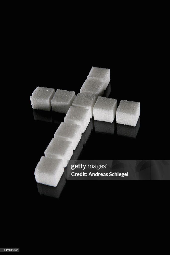 A cross made out of sugar cubes