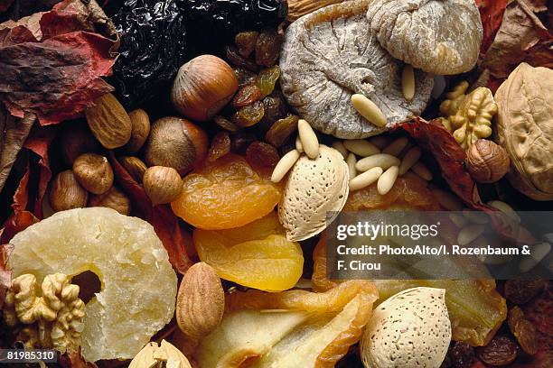 assortment of dried fruits and nuts, full frame - fruta seca - fotografias e filmes do acervo