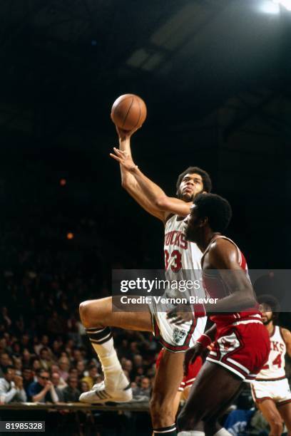 Kareem Abdul Jabbar of the Milwaukee Bucks shoots a hook shot during a against the Chicago Bulls in the 1972 season at the MECCA Arena in Milwaukee,...