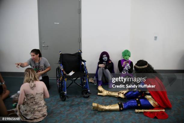 Visitors rest at the San Diego Convention Center during Comic Con International on July 20, 2017 in San Diego, California. Comic Con International is...