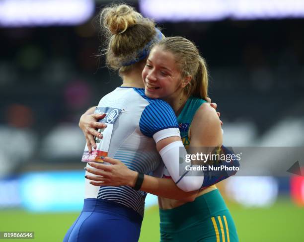 Isis Holt of Australia celebrates World Record with Maria Lyle of Great Britain Women's 100m F35 Final during World Para Athletics Championships at...