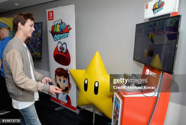 Max Charles from the television series "The Strain" stopped by Nintendo at the TV Insider Lounge to check out Nintendo Switch during Comic-Con...