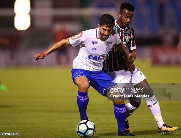 Jefferson Orejuela of Fluminense struggles for the ball with Lucas Silva of Cruzeiro during a match between Fluminense and Cruzeiro as part of...