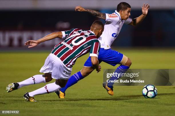 Richarlison of Fluminense struggles for the ball with Lucas Romero of Cruzeiro during a match between Fluminense and Cruzeiro as part of Brasileirao...