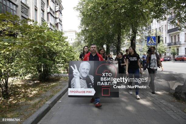 Few hundred activists and media representatives march downtown Kyiv, Ukraine pass by the President Office and Internal Ministry from the site where...