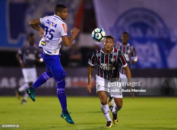 Richarlison of Fluminense struggles for the ball with Murilo Cerqueira of Cruzeiro during a match between Fluminense and Cruzeiro as part of...