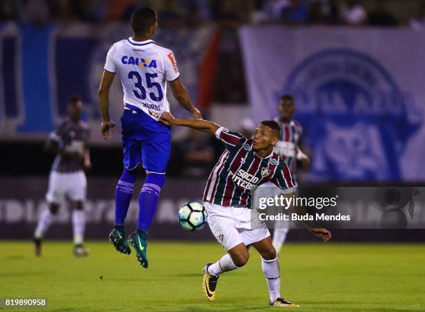 Richarlison of Fluminense struggles for the ball with Murilo Cerqueira of Cruzeiro during a match between Fluminense and Cruzeiro as part of...